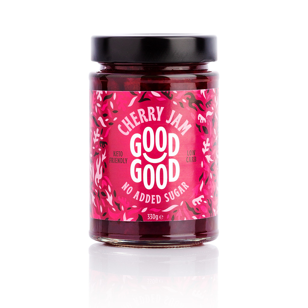 Keto Dżem z firmy GoodGood o smaku czereśniowym z jarzębiną. 330g produktu znajduje się w małym szklanym słoiczku z czarną zakrętką.
